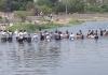 Farmers Stage 'Jal Samadhi' Protest Over Pending Sugarcane Dues from Gokul Sugar Mill