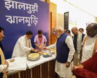PM eats 'Jhal Muri' once again, this time served by CM Adhikari  As TMC rebel bloc set to join NDA