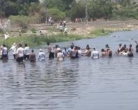 Farmers Stage 'Jal Samadhi' Protest Over Pending Sugarcane Dues from Gokul Sugar Mill